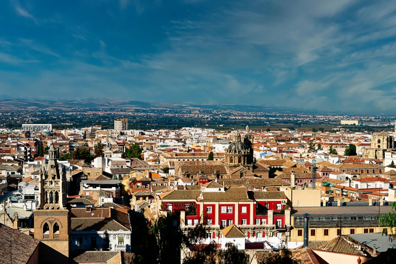 a view of a city from the top of a hill, by Juan Giménez, pexels contest winner, baroque, blue sky, square, high resolution image, estefania villegas burgos