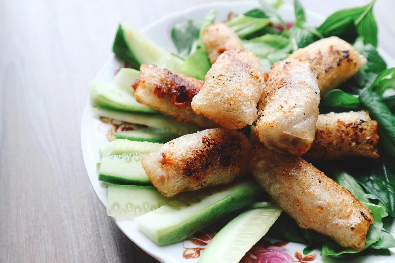 a close up of a plate of food on a table, dang my linh, profile image, crispy, thumbnail