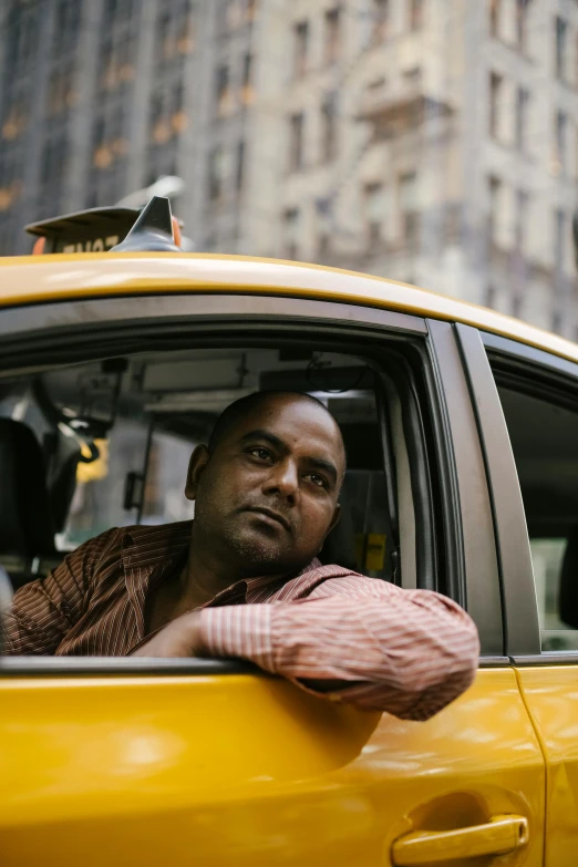 a man sitting in the driver's seat of a taxi, a photo, by Alison Geissler, square, diverse, hindu, humans of new york style