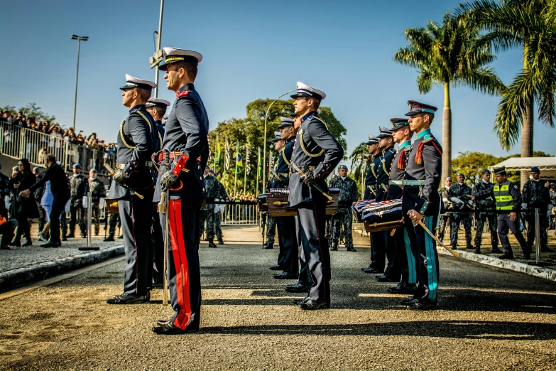 a group of men in uniform standing next to each other, by Felipe Seade, pexels contest winner, visual art, drums, avatar image, afternoon sunshine, royal photo