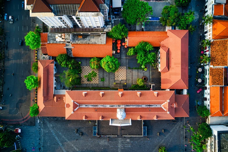 an aerial view of a building with a red roof, pexels contest winner, quito school, bangkok townsquare, post - soviet courtyard, nature photo, square