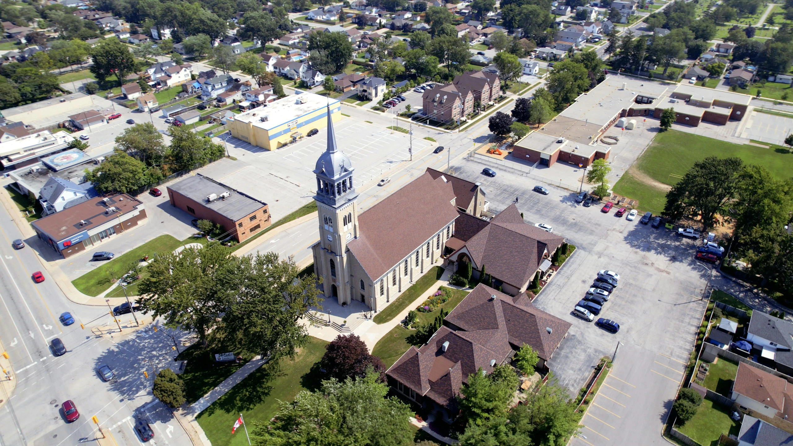 an aerial view of a small town with a church, by Joe Stefanelli, from wheaton illinois, slide show, 4 k image, fan favorite