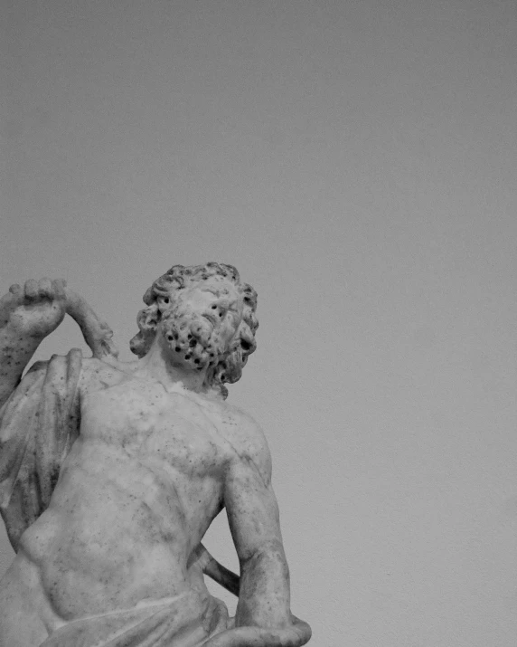 a black and white photo of a statue, inspired by Antonio Canova, pexels contest winner, his back is turned, satyr, album cover, barocco