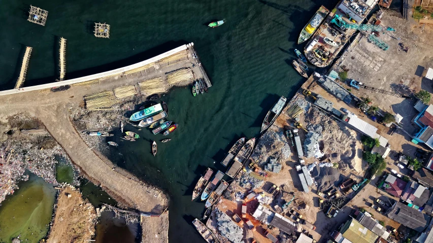 a group of boats floating on top of a body of water, by Patrick Pietropoli, pexels contest winner, conceptual art, kowloon walled city, satellite imagery, morocco, ismail inceoglu and ruan jia