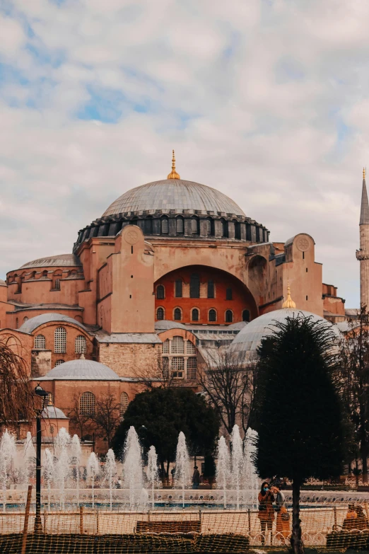 a large building with a fountain in front of it, domes, 🚿🗝📝, byzantine, top selection on unsplash