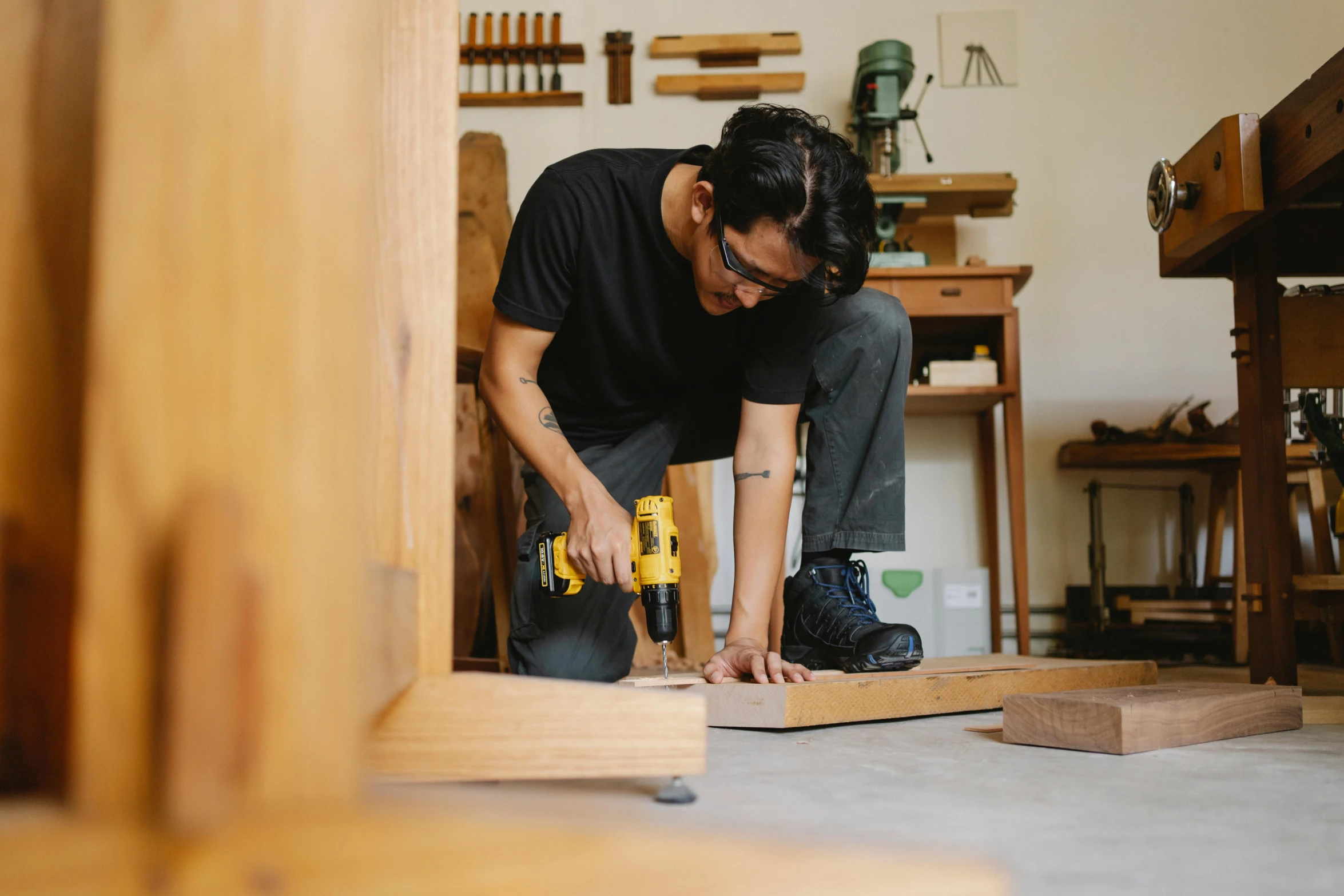 a man is working on a piece of wood, pexels contest winner, adrian tomine, full body image, thumbnail, 1 2 9 7