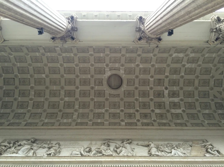 a ceiling with columns and a clock on it, a marble sculpture, inspired by Piero della Francesca, inside the sepulchre, image, pareidolia, white ceiling