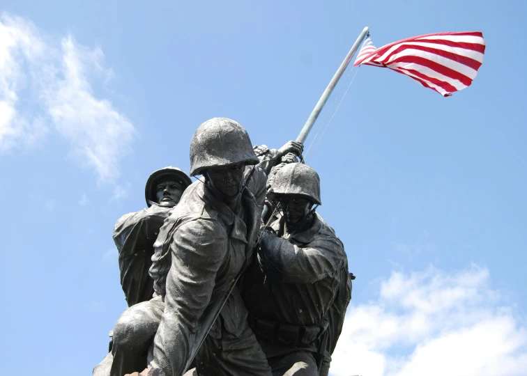 a statue of soldiers raising the american flag, profile image, marine armor, tourist photo, red and blue garments