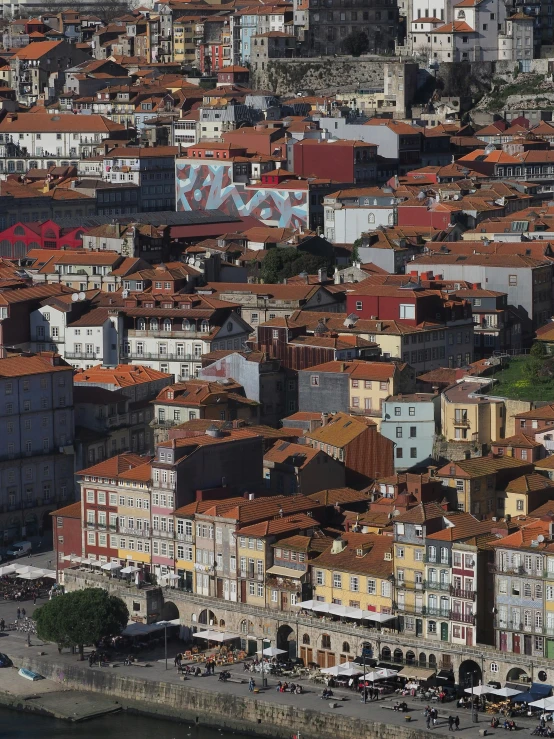 a view of a city from a bird's eye view, by Sven Erixson, pexels contest winner, graffiti, azulejo, panorama view, payne's grey and venetian red, slide show