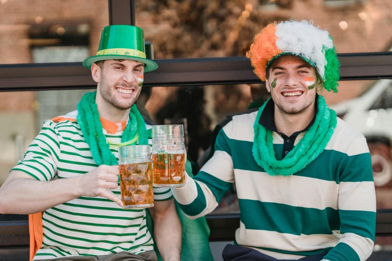 two men dressed up for st patrick's day drinking beer, pexels contest winner, striped, 🚿🗝📝, 🌸 🌼 💮, sport