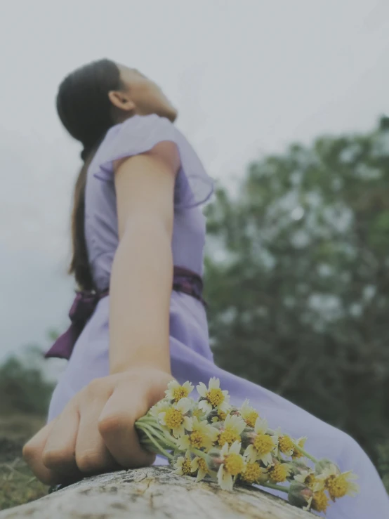 a woman sitting on a rock with a bunch of flowers, unsplash, visual art, lavander and yellow color scheme, holding daisy, teenage girl, detached sleeves