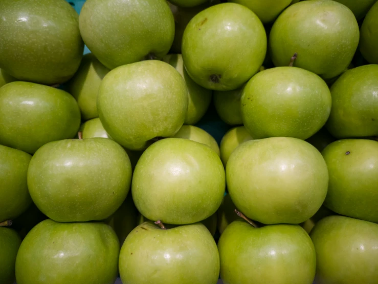 a pile of green apples sitting on top of each other, unsplash, square, australian, rounded corners, shot with sony alpha