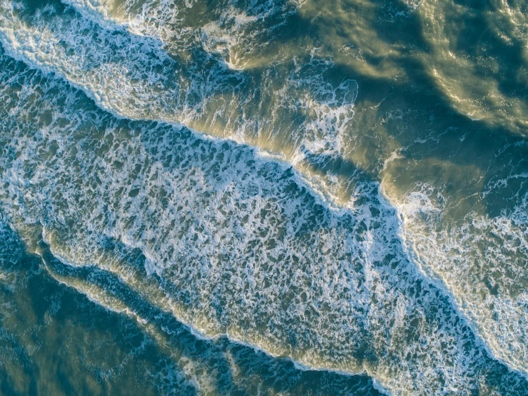 an aerial view of a body of water, pexels contest winner, generative art, rough waves, oceanside, detailed photo 8 k, album art