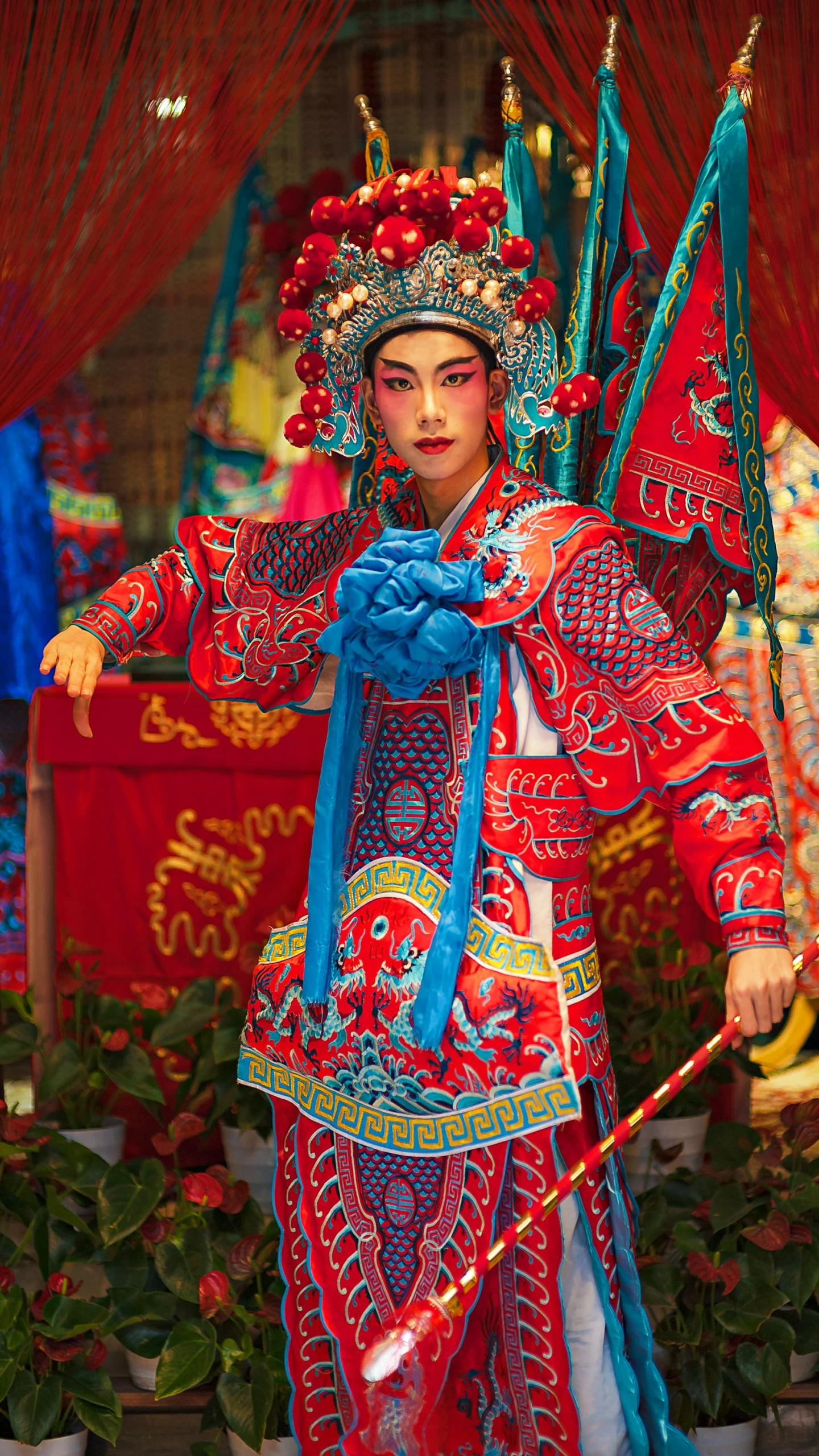 a close up of a person in a costume, inspired by Xie Huan, bright colors with red hues, slide show, square, drama