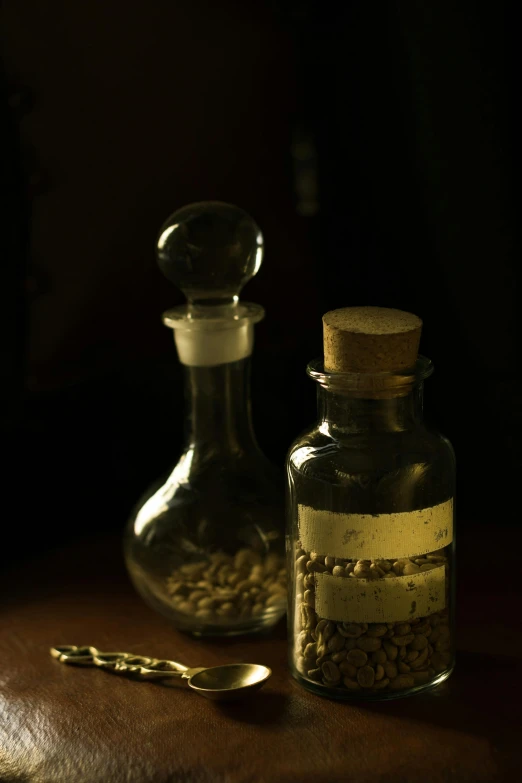 a couple of bottles sitting on top of a wooden table, a portrait, inspired by Pieter Claesz, flickr, seeds, pills, low-light photograph, product display photograph