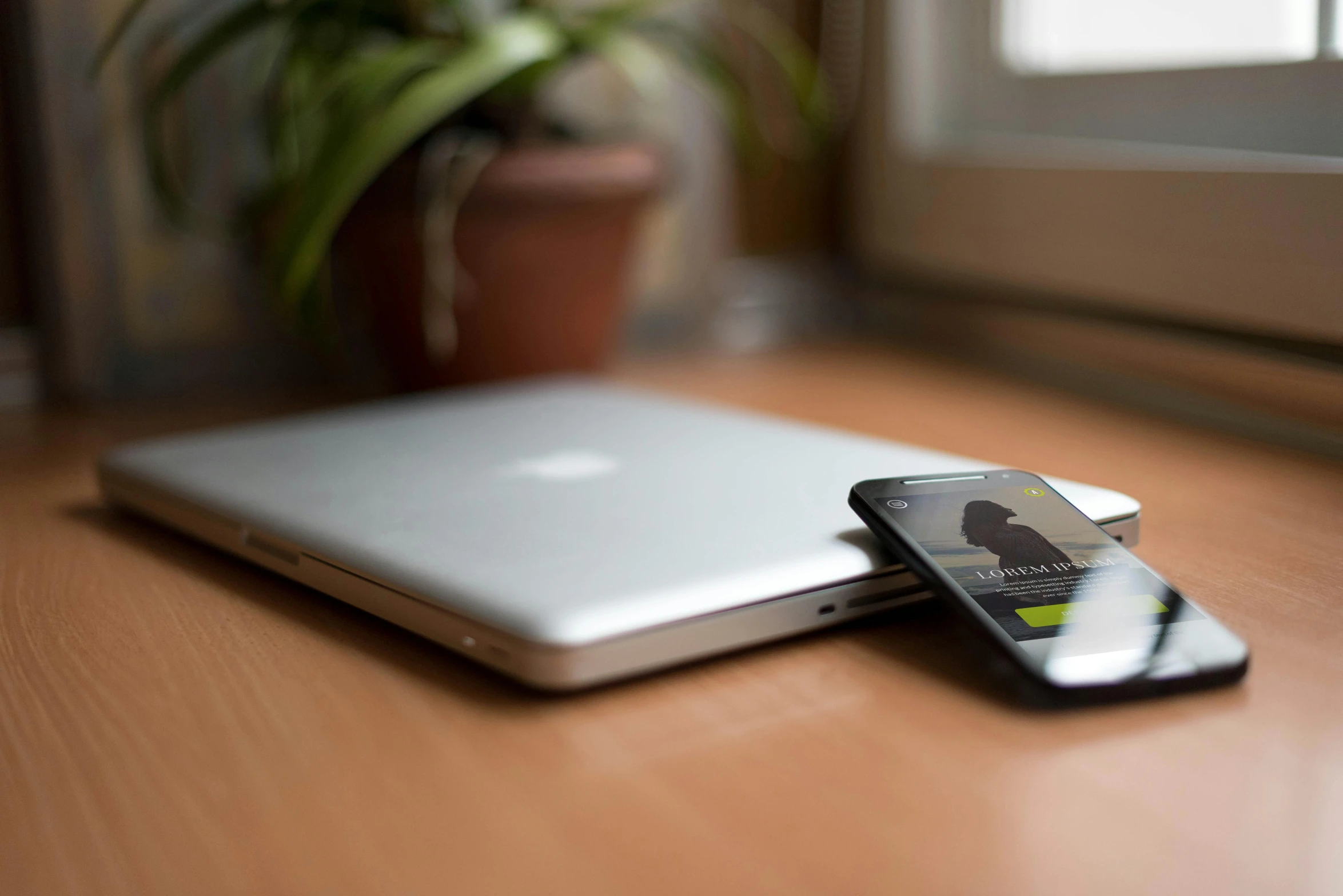 a laptop computer sitting on top of a wooden desk, by Julia Pishtar, iphone, various posed, high-tech devices, thumbnail