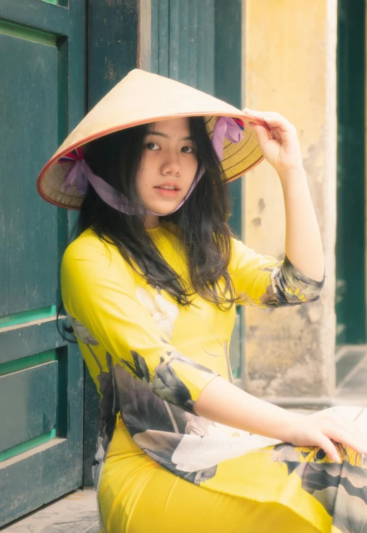 a woman wearing a yellow dress and a hat, inspired by Tan Ting-pho, pexels contest winner, square, young asian girl, cynthwave, traditional