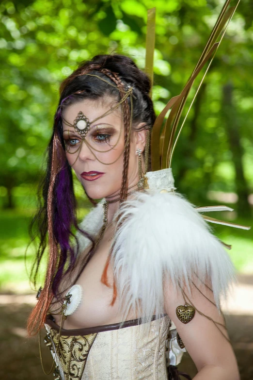 a woman in a corset holding a bow and arrow, orgnic headpiece, bone jewellery, dryad in the forest, she has feathers