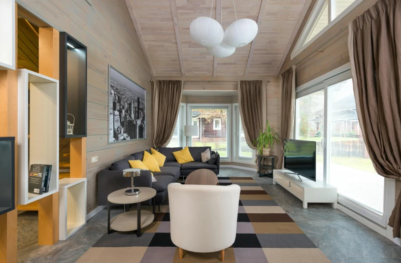 a living room filled with furniture and a flat screen tv, inspired by Constantin Hansen, pexels contest winner, light and space, luxurious wooden cottage, silver and yellow color scheme, vaulted ceiling, high quality photo