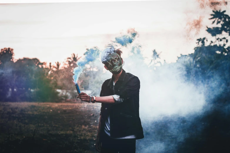 a man standing in a field with smoke coming out of his mouth, pexels contest winner, aestheticism, masked person in corner, lil peep, :6 smoke grenades, smoking woman