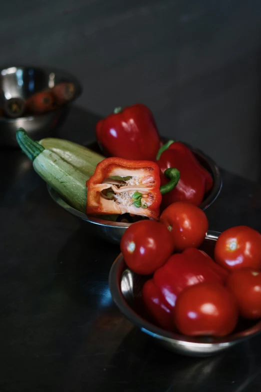 a close up of a plate of food on a table, pepper, bowl filled with food, vegetables, ((still life))