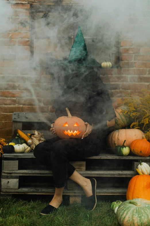 a woman sitting on a bench surrounded by pumpkins, pexels contest winner, smoke around him, pot, dark. no text, hazy