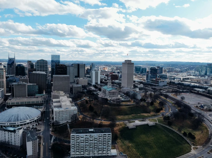 a view of a city from the top of a building, by Dan Frazier, unsplash contest winner, visual art, memphis, view from helicopter, wide establishing shot, slide show