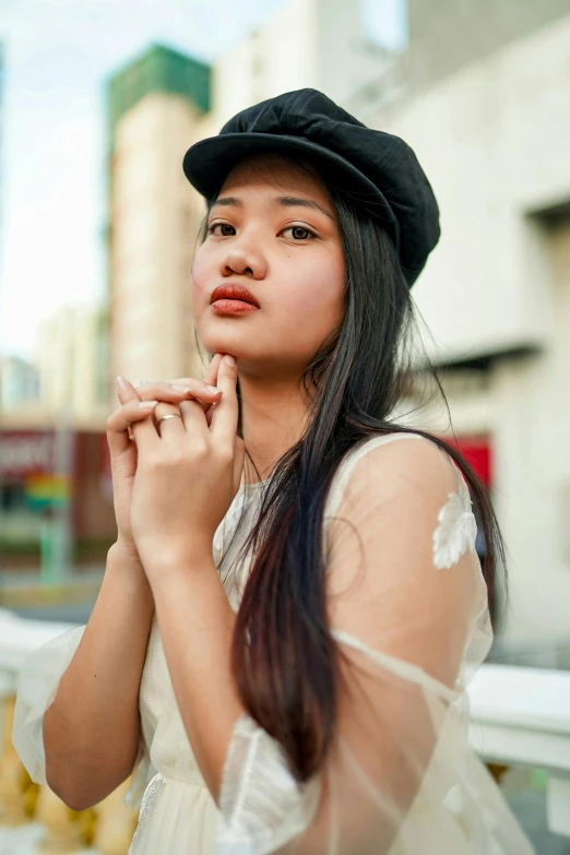 a woman in a white dress and a black hat, pexels contest winner, young asian girl, ((portrait)), promo image, street pic