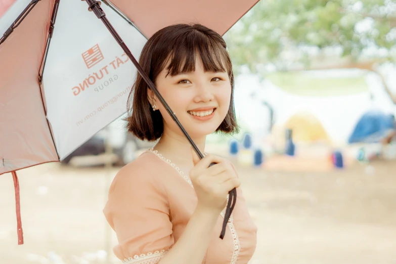 a woman in a pink dress holding an umbrella, inspired by Kim Jeong-hui, pexels contest winner, dilraba dilmurat, welcoming smile, brown, avatar image