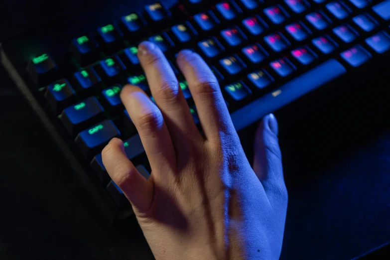 a close up of a person typing on a keyboard, a computer rendering, inspired by Elsa Bleda, shutterstock, computer art, counter strike, scary pose, asmongold, dim blue light