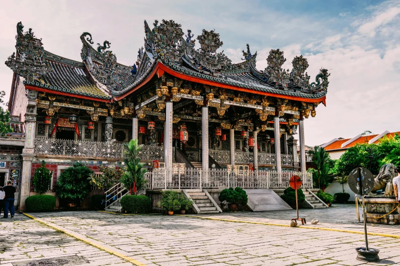 a group of people standing in front of a building, inspired by Wang Yi, pexels contest winner, chinese temple, longhouse, square, china silk 3d dragon