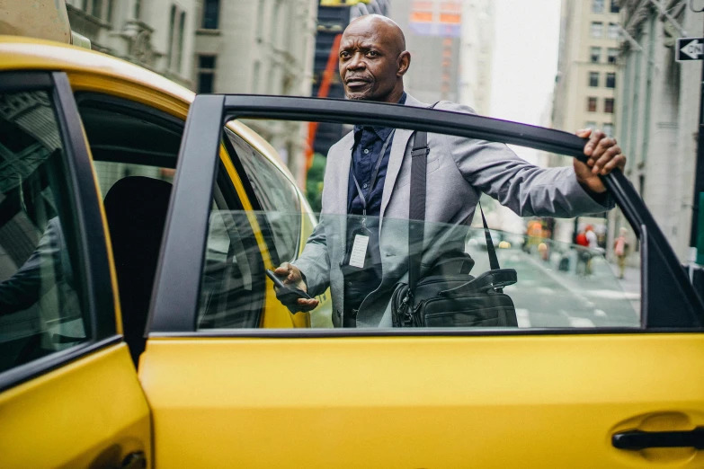 a man in a suit getting out of a taxi, by Daniel Gelon, happening, square, fan favorite, high quality upload, promo material