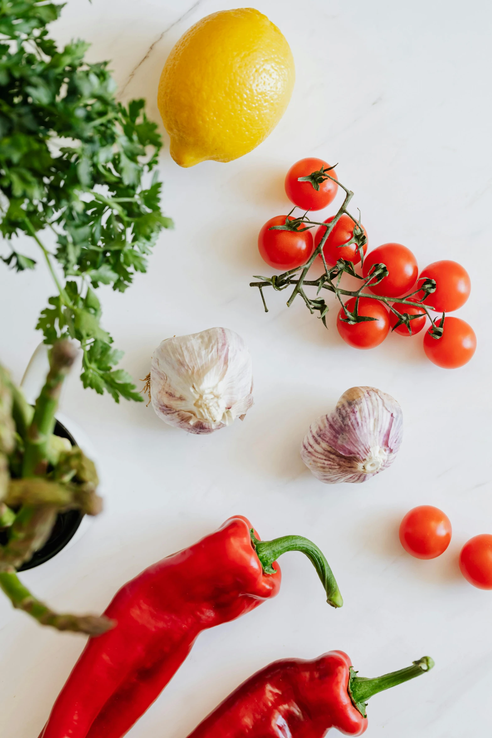 a bunch of vegetables sitting on top of a table, a still life, pexels, white backround, mediterranean features, profile image, uncrop