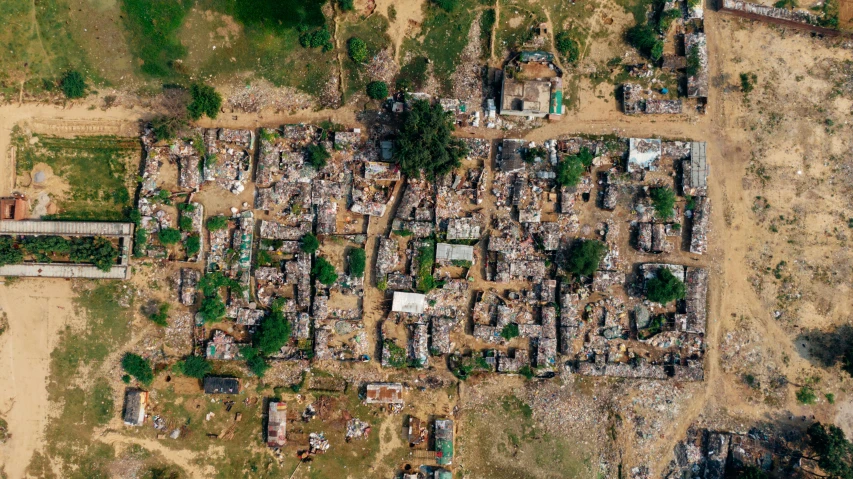 an aerial view of a village in the philippines, by Adam Marczyński, reddit, conceptual art, debris flying everywhere, somalia, photograph taken in 2 0 2 0, ultra wide angle isometric view