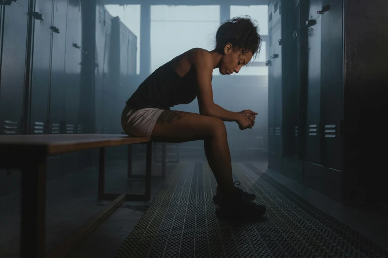 a woman sitting on a bench in a locker, pexels contest winner, sweaty. steam in air, ashteroth, dark taint :: athletic, profile image