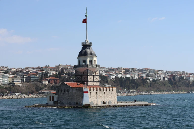 a large building sitting on top of a body of water, hurufiyya, istanbul, lookout tower, 15081959 21121991 01012000 4k, thumbnail