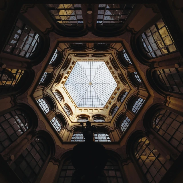 a view looking up at the ceiling of a building, an album cover, by Lubin Baugin, unsplash contest winner, baroque, hexagonal shaped, looking in front, alessio albi, a wide open courtyard in an epic