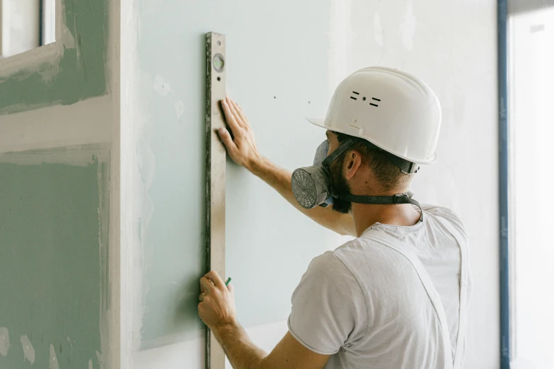 a man that is standing in front of a wall, diy, profile image, plating, background image