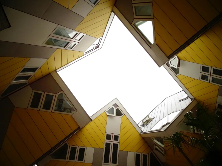 a picture of the inside of a building, unsplash contest winner, modular constructivism, view of houses in amsterdam, golden shapes, skylights, wikimedia