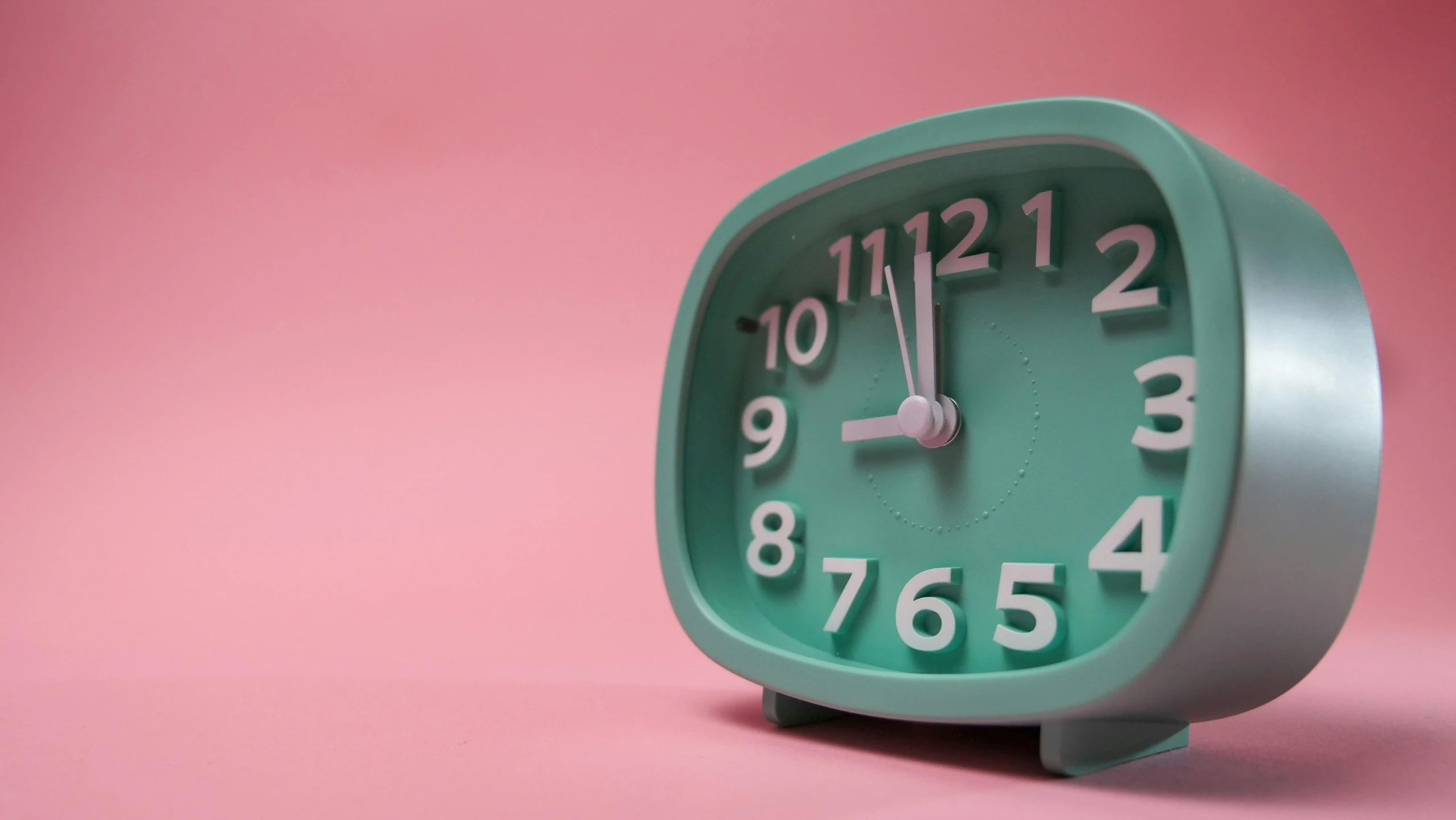 a green clock sitting on top of a pink surface, a 3D render, trending on pexels, late night, teal aesthetic, profile picture, aaaaaaaaaaaaaaaaaaaaaa