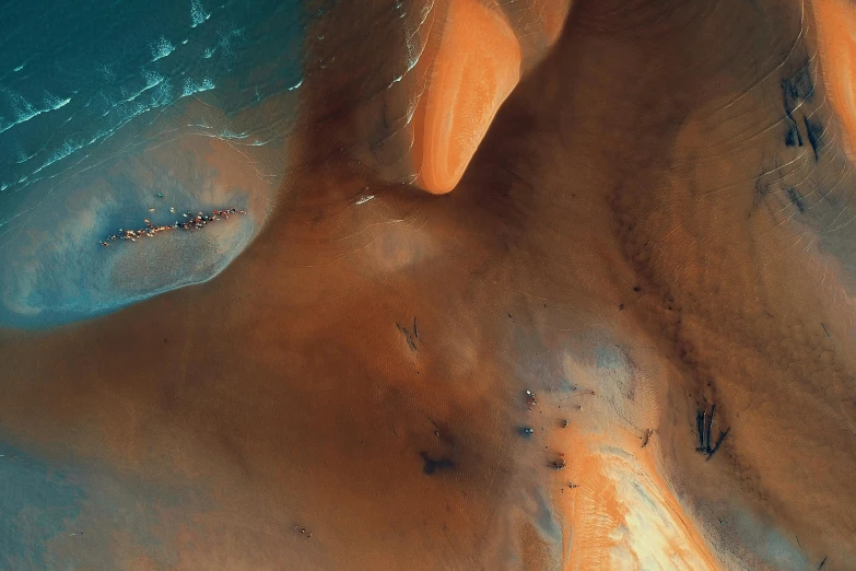 an aerial view of a body of water, by Filip Hodas, pexels contest winner, space art, desert dunes, neck zoomed in from lips down, behance lemanoosh, orange and teal