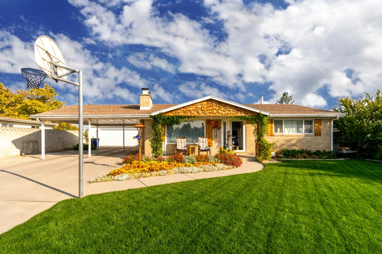 a house with a basketball hoop in the front yard, a digital rendering, by Brigette Barrager, unsplash, panoramic, prairie landscaping, fall season, 15081959 21121991 01012000 4k