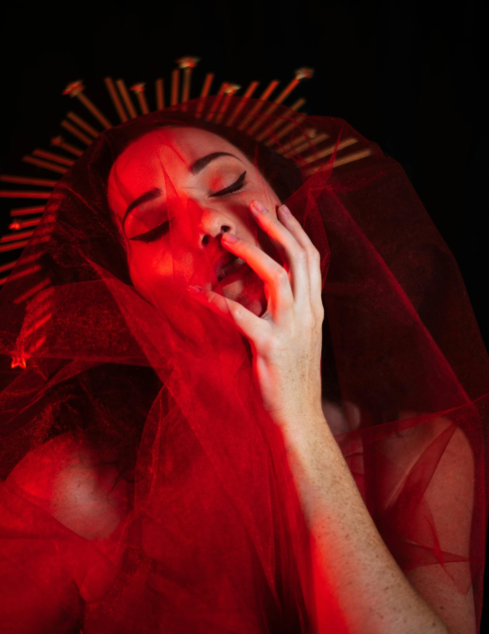 a woman with a veil covering her face, an album cover, inspired by Elsa Bleda, pexels contest winner, transgressive art, glowing red veins, <pointé pose>;open mouth, deity), lgbtq