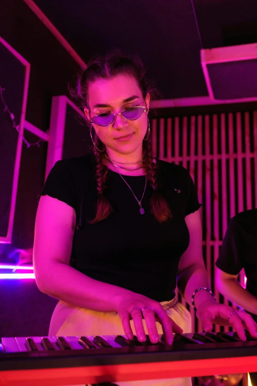 a couple of people that are standing in front of a keyboard, purple light, kailee mandel, boiler room, profile image