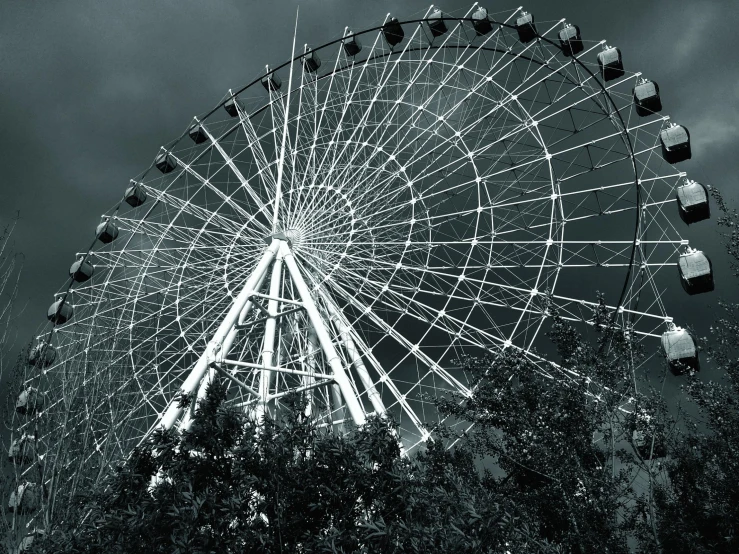 a black and white photo of a ferris wheel, a black and white photo, pexels contest winner, romanticism, taken in silver dollar city, eery, stratosphere, 000 — википедия
