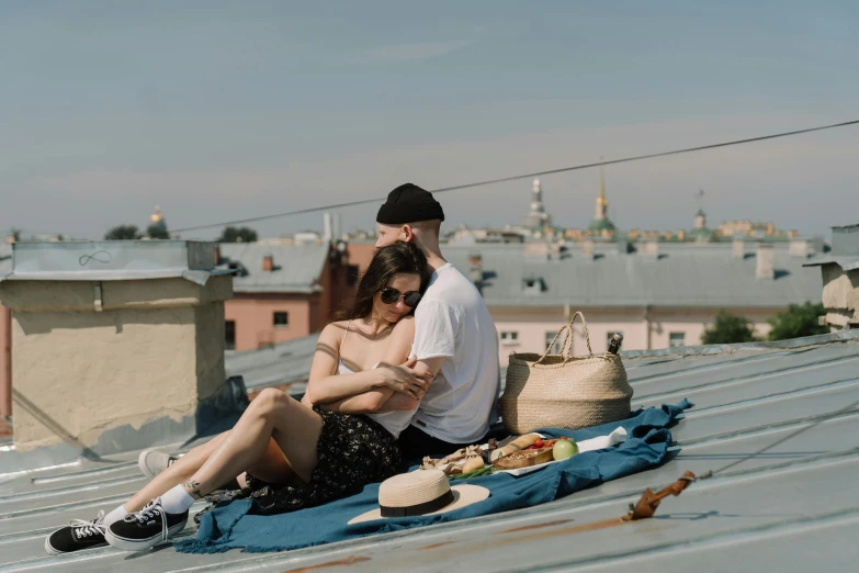 a man and a woman sitting on top of a roof, by Emma Andijewska, pexels contest winner, picnic, angelina stroganova, 15081959 21121991 01012000 4k, cuddling
