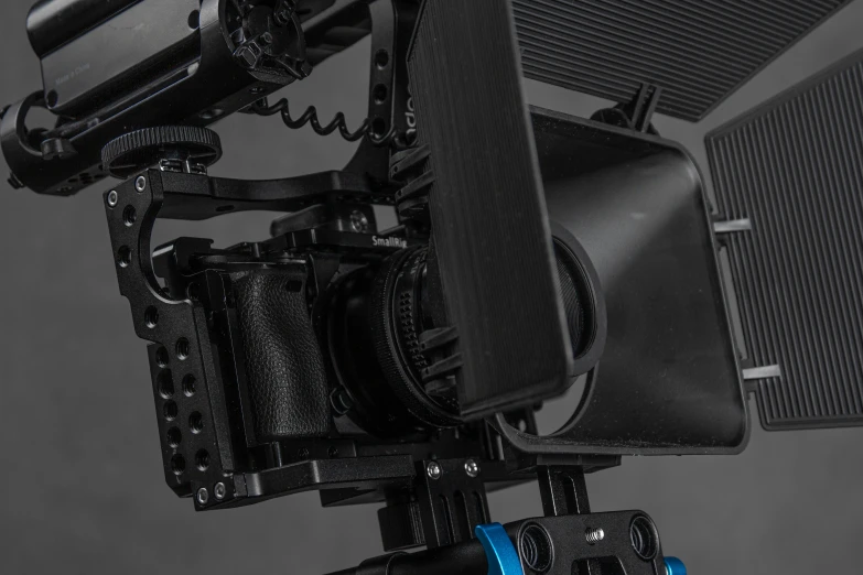 a close up of a camera on a tripod, a 3D render, featured on zbrush central, video art, commercial banner, blue color grading, sony a 7 s, cinematic outfit photo