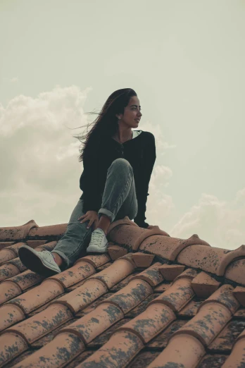 a woman sitting on top of a roof, trending on pexels, profile image, ceramic, handsome girl, devastated