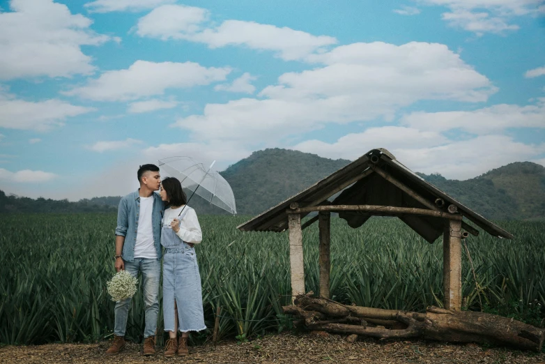 a man and woman standing next to each other in a field, pexels contest winner, thawan duchanee, square, background image, romantic themed