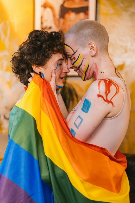 a couple of people that are holding a rainbow flag, a photo, trending on pexels, renaissance, facepaint, adam ondra, square, hugging